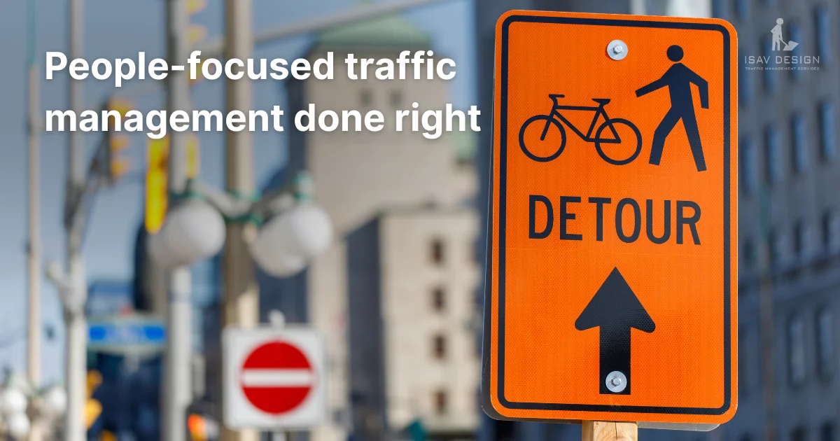 Close-up of urban detour sign for bike and pedestrian traffic.
